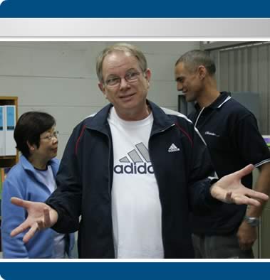 Garry talking with Susie and Rob in the background